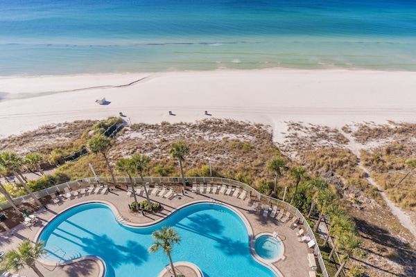 Balcony view of beachfront pool and gulf