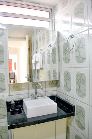 Hair dryer, towels, soap, shampoo