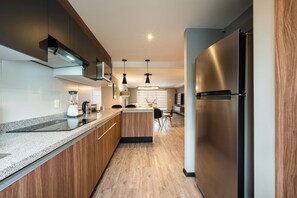 Deluxe Apartment, 2 Bedrooms | Private kitchen | Full-size fridge, microwave, oven, stovetop