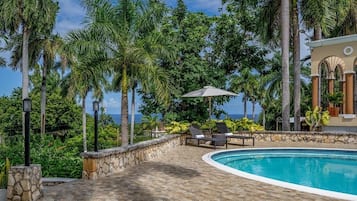 Outdoor pool, pool umbrellas, sun loungers