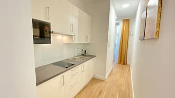 Appartement Affaires, 1 grand lit, non-fumeur, balcon | Cuisine privée