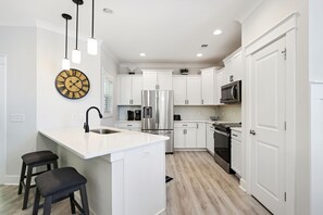 Fridge, microwave, dishwasher, coffee/tea maker