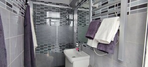 Shower, towels, soap, shampoo