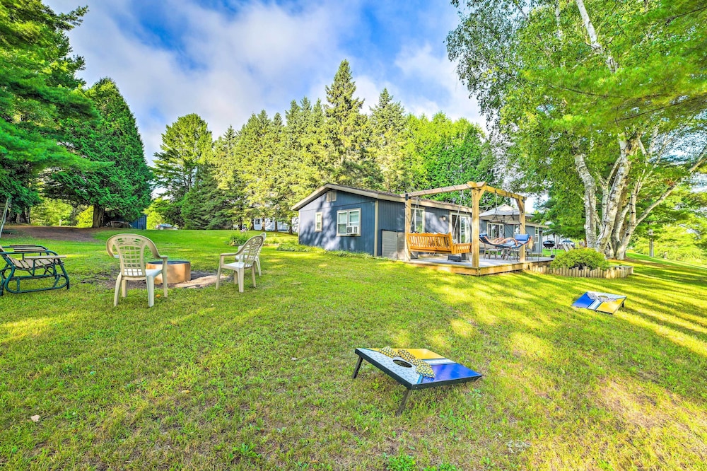Riverfront Home w/ Dock ~ 6 Mi to Cheboygan!