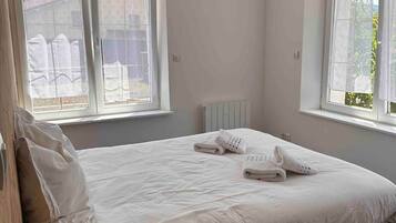 3 slaapkamers, een strijkplank/strijkijzer, gratis wifi