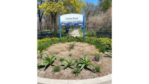 A park entrance sign with a pathway leading into Lytton Park. - Elegant, large 2 bedroom main floor apartment (Toronto)