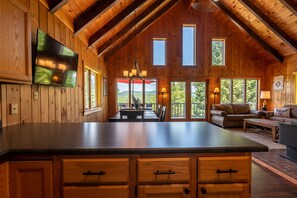 Smart TV, fireplace, foosball, books