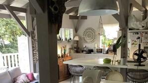 A spacious kitchen with a large island, white cabinetry, and a hanging light fixture. - PROMO: CHARMING POOL VILLA LES TROIS ILETS 3 bedrooms sleeps 8. WATCH  (Les trois ilets)