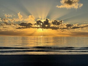 On the beach, sun loungers, beach towels