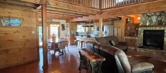 Real Log Cabin with Seasonal Pool and Hot Tub near Blue Springs Ranch