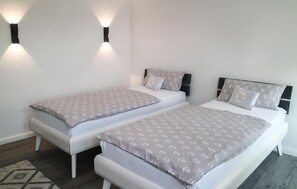 2 عدّة غرف نوم وسرير سفر وواي فاي مجانًا وملاءات أسرّة