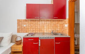 Fridge, stovetop, coffee/tea maker, cookware/dishes/utensils