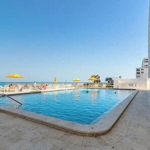 Outdoor pool, a heated pool - Spectacular Oceanfront  Condo - New Host Listing for March & April  (New Smyrna Beach)