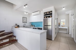 Fridge, coffee/tea maker, cookware/dishes/utensils