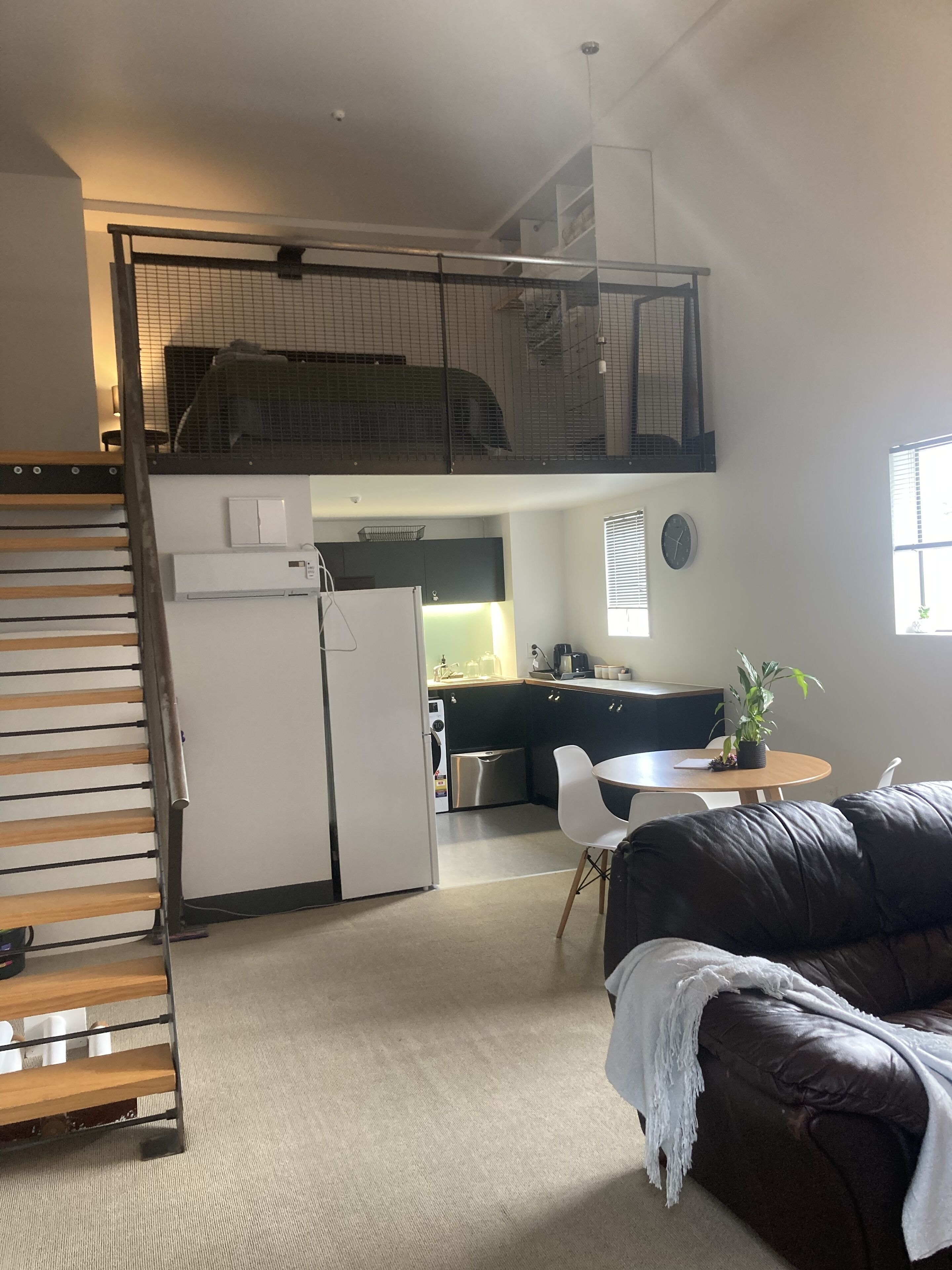 View of Mezzanine/loft from ground floor loving area 