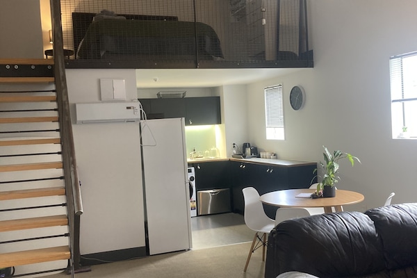 View of Mezzanine/loft from ground floor loving area