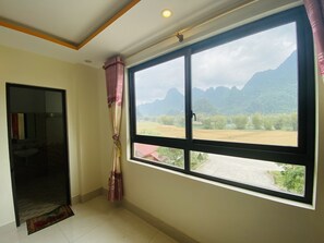 Premium bedding, desk, laptop workspace, free WiFi