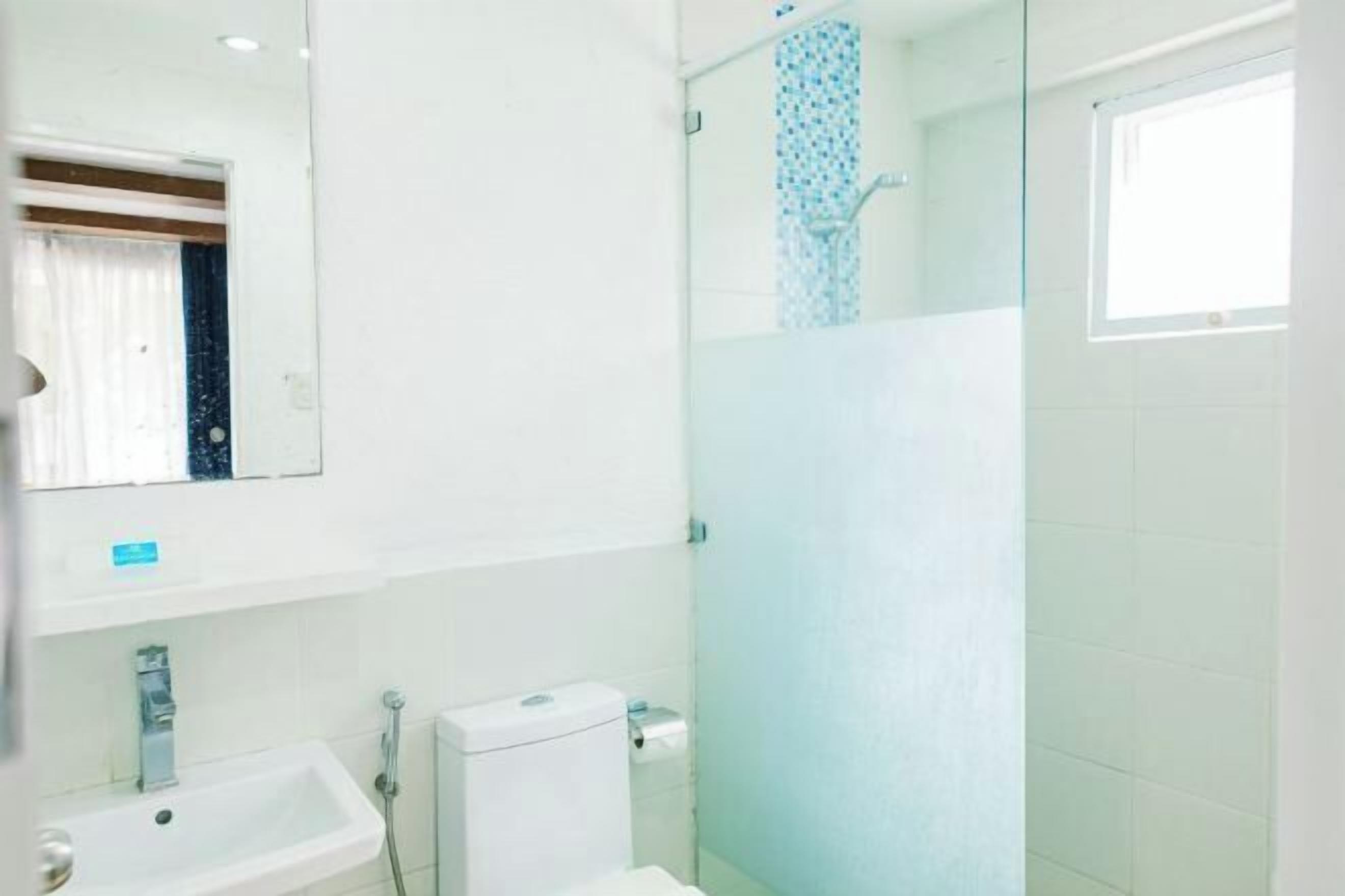 Shower, free toiletries, hair dryer, slippers