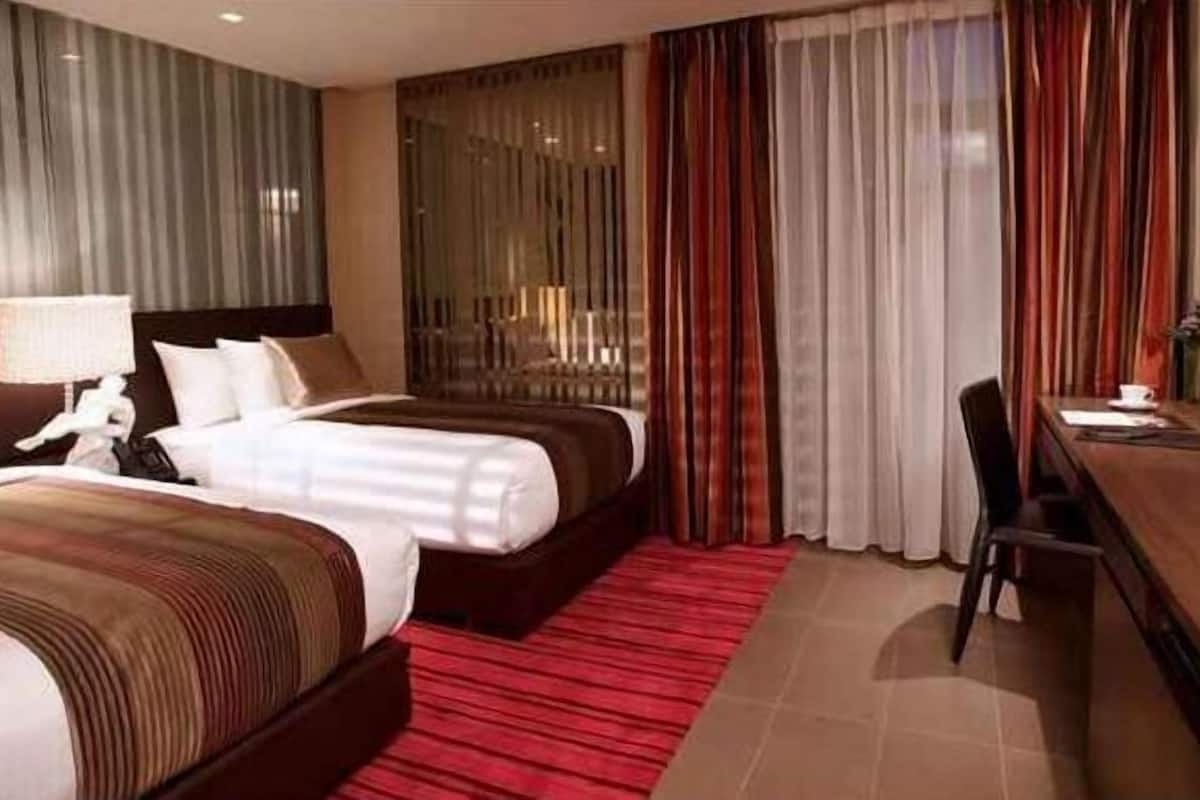 Laptop workspace, free WiFi, bed sheets