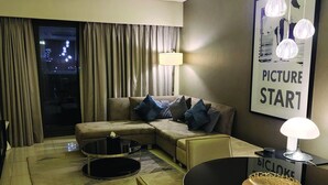 Living area - Quill Residence One Bedroom Apartment Burj Khalifa View (Dubai)