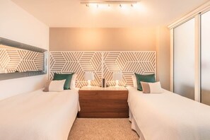 2 habitaciones, tabla de planchar con plancha y wifi gratis 