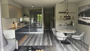 Comfort Apartment | Living room | Flat-screen TV