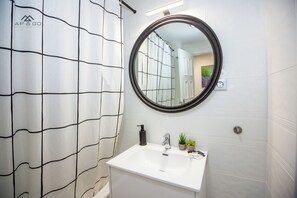 Hair dryer, towels, soap, shampoo