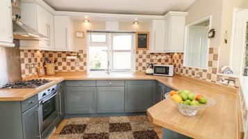 Fridge, electric kettle, toaster, cookware/dishes/utensils