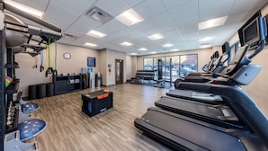 A gym with treadmills, weight machines, and a rowing machine. - Hampton Inn Columbus Downtown, GA (Columbus)