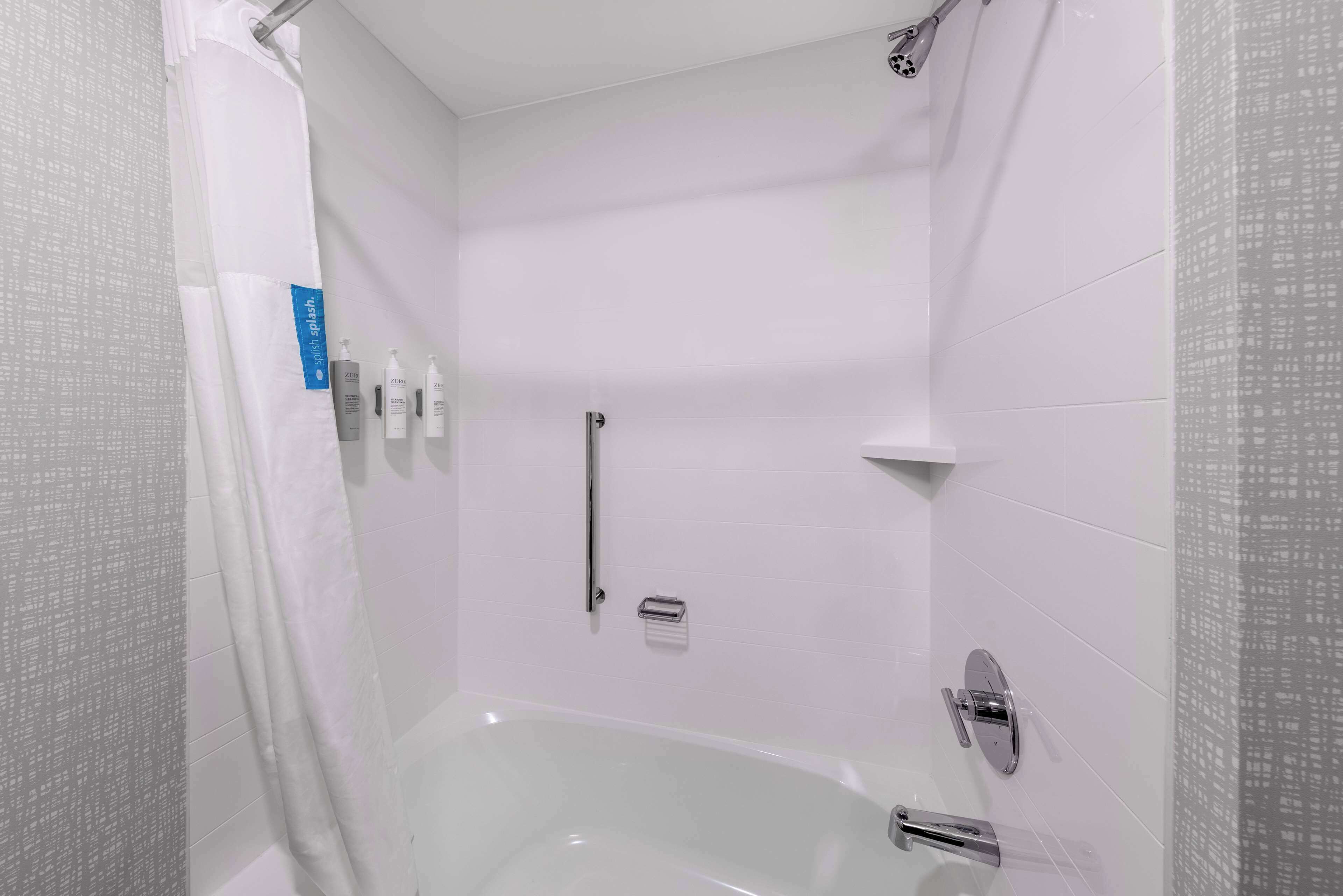Standard Room, 2 Queen Beds, Refrigerator | Bathroom | Combined shower/tub, free toiletries, hair dryer, towels