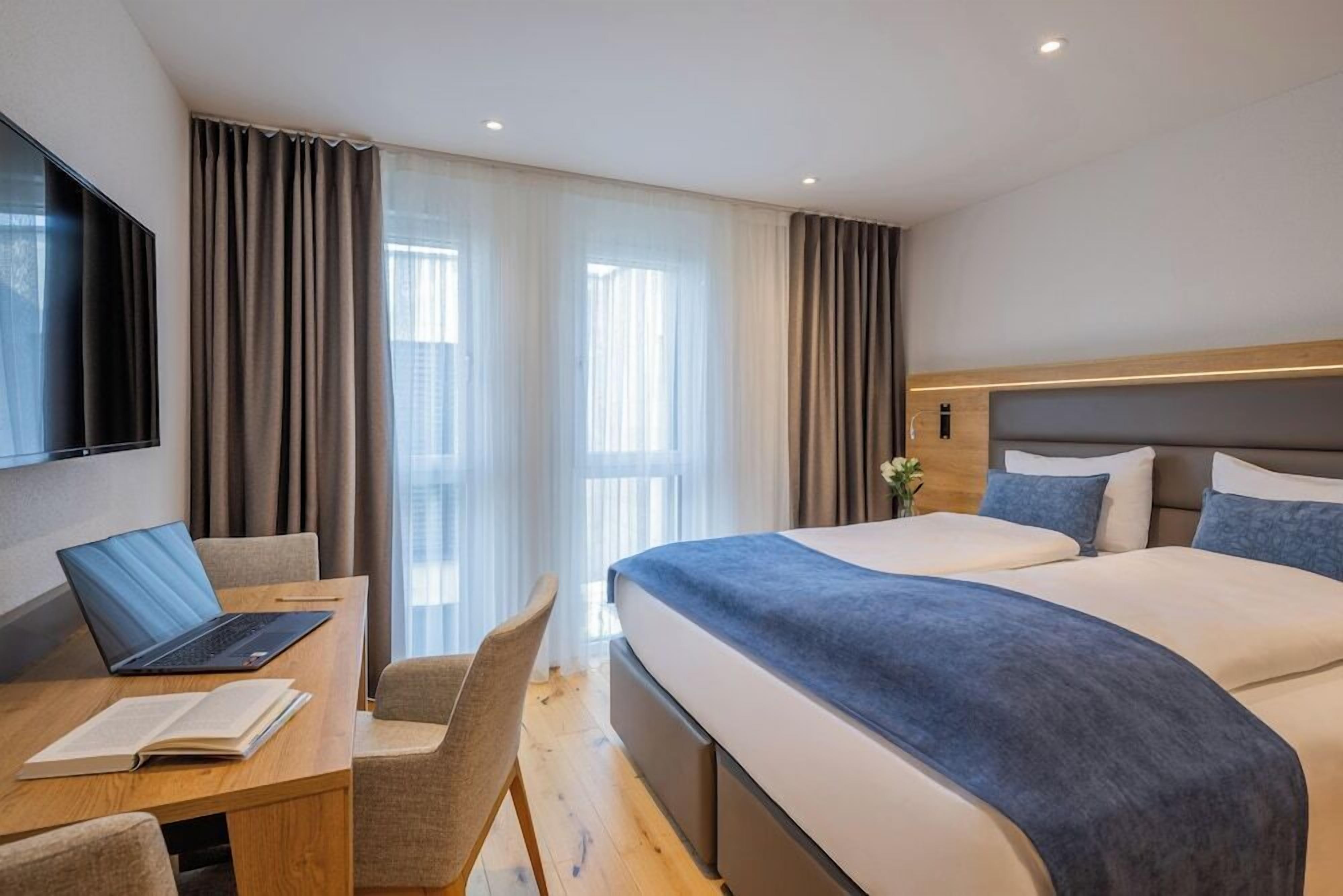 In-room safe, desk, laptop workspace, blackout curtains