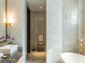 Bathtub, bidet, towels, soap