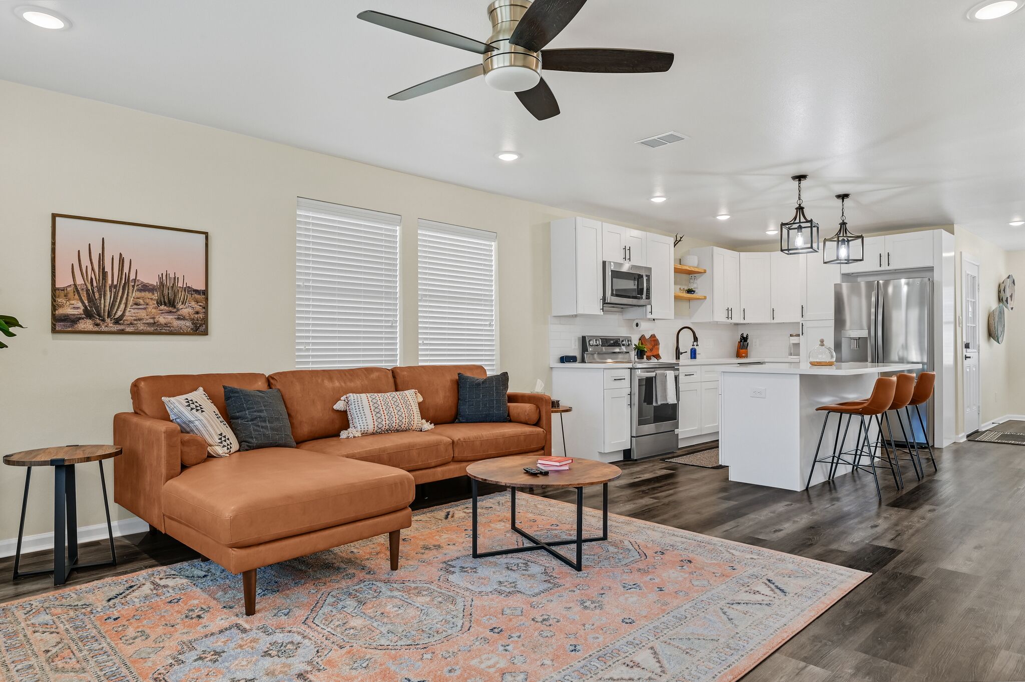 Open concept living room and kitchen with island