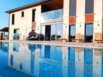 Heated infinity salt water pool with stunning views