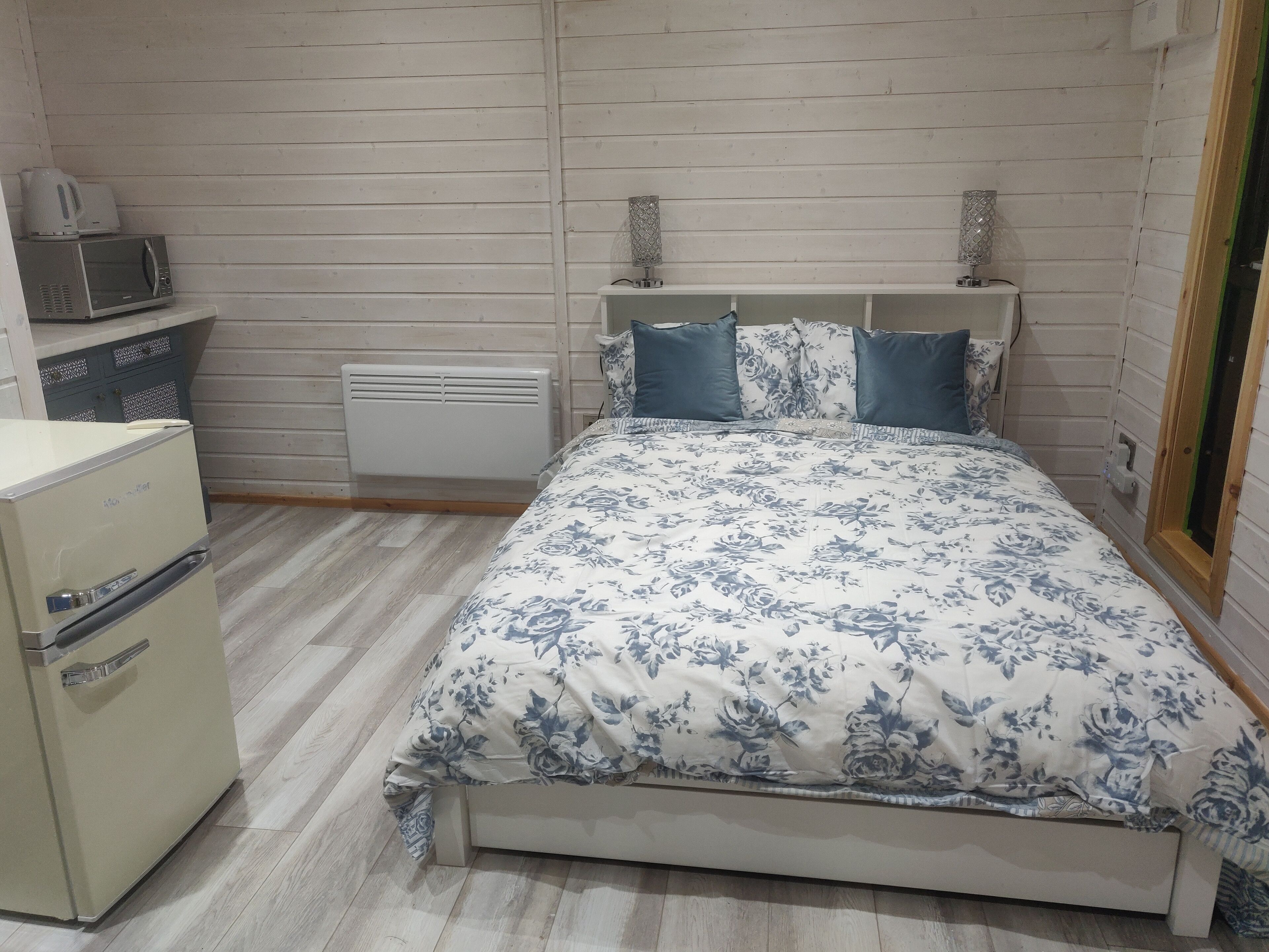 1 bedroom, desk, iron/ironing board, travel crib