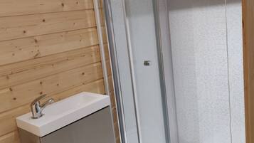 Shower, eco-friendly toiletries, hair dryer, towels