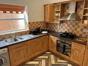 Appartement, plusieurs lits | Cuisine privée
