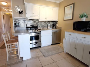 Condo, Multiple Beds, Balcony, Beach View (B318) | Private kitchen | Fridge, microwave, oven, stovetop