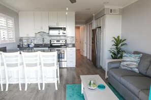 Condo, 1 Queen Bed with Sofa bed, Balcony, Beach View (B332) | Private kitchen | Fridge, microwave, oven, stovetop