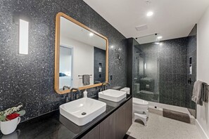 Shower, hair dryer, towels, soap