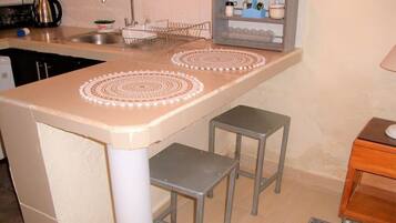 Fridge, microwave, coffee/tea maker, electric kettle