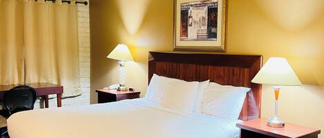 Room, 1 King Bed, Non Smoking | Desk, blackout drapes, iron/ironing board, free WiFi