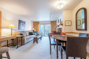 Smart TV, fireplace, books, printers