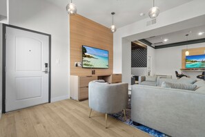 Presidential Suite, 1 King Bed, Jetted Tub | Living area | 55-inch Smart TV with satellite channels, TV - Aspire Inn Studios & Spas (Bellflower)