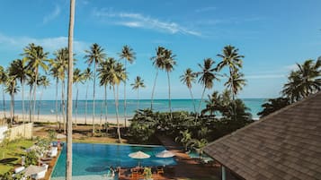 2 outdoor pools, open 8:00 AM to 9:00 PM, pool umbrellas, sun loungers