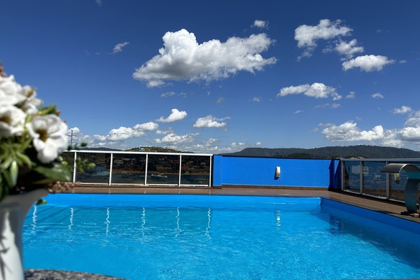 Outdoor pool, pool umbrellas, pool loungers