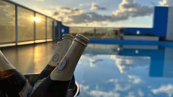 Outdoor pool, pool umbrellas, pool loungers