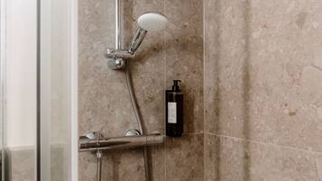 Shower, eco-friendly toiletries, hair dryer, slippers