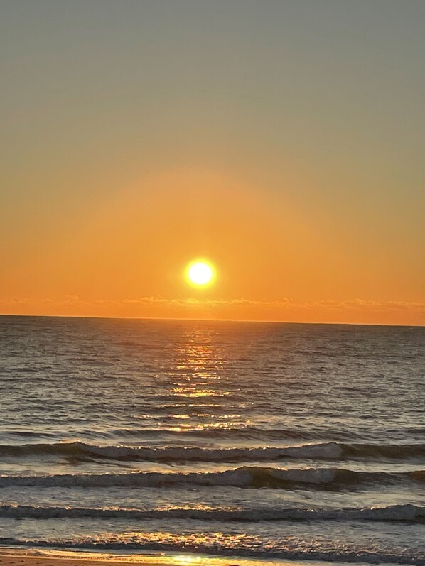 On the beach, sun loungers