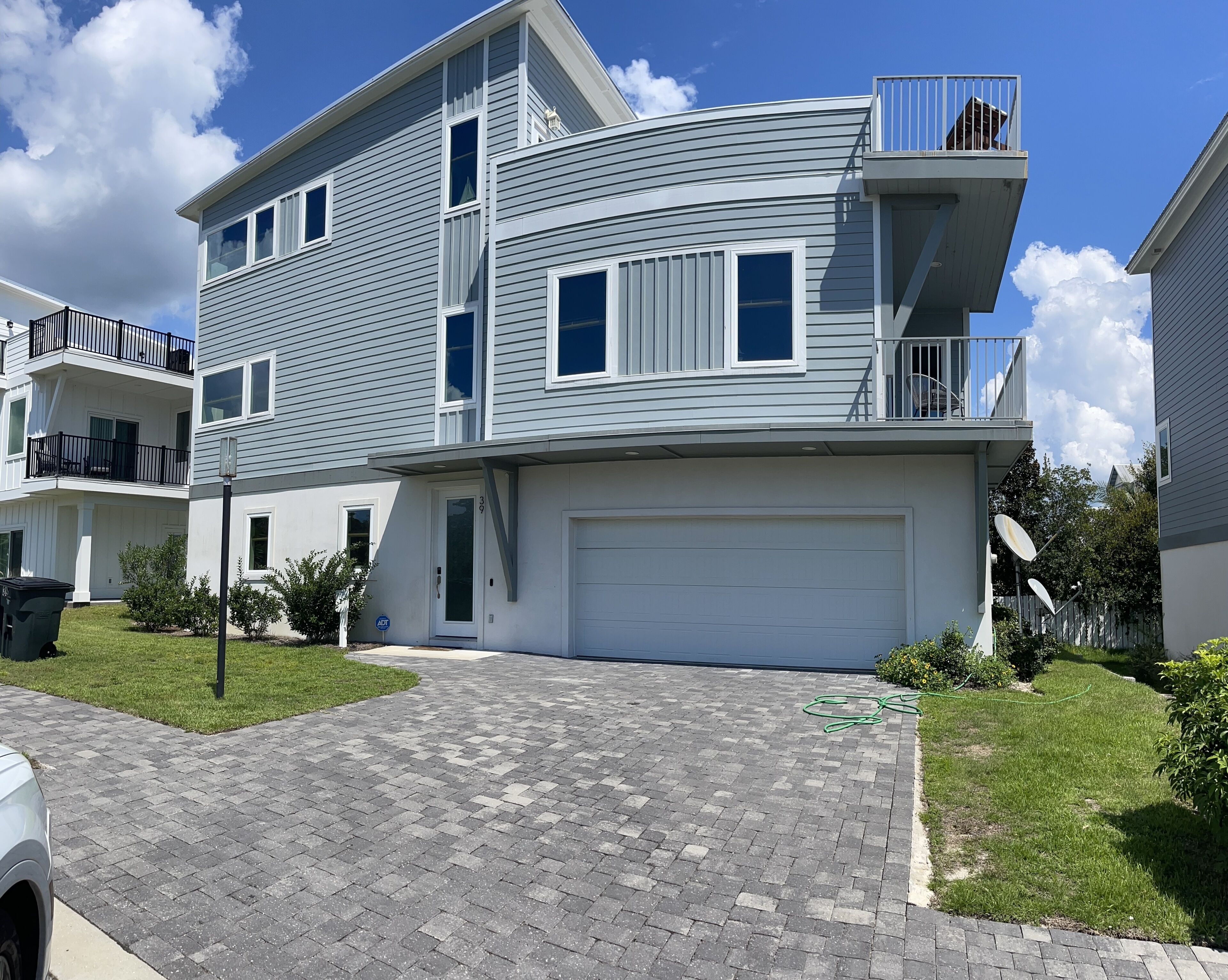 Coastal home with rooftop and community pool